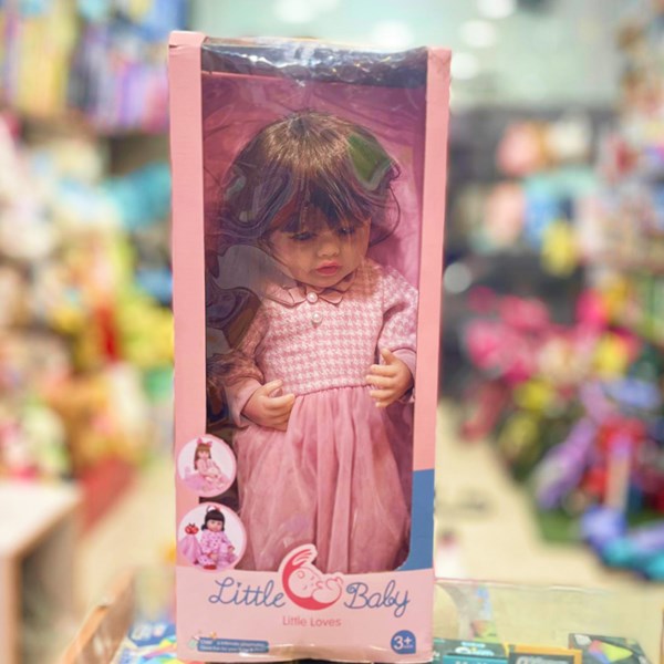 عروسک سیلیکونی دختر بچه 50 سانتی سخنگو با پیراهن صورتی_عروسک