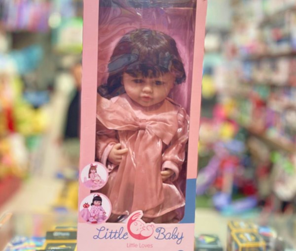 عروسک سیلیکونی دختر بچه 50 سانتی سخنگو با کلاه صورتی_عروسک