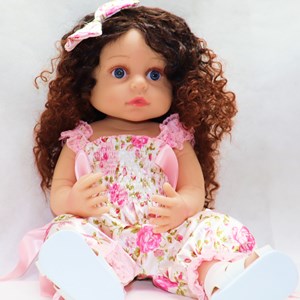 عروسک سیلیکونی دختر بچه 50 سانتی سخنگو با گل سر صورتی_عروسک